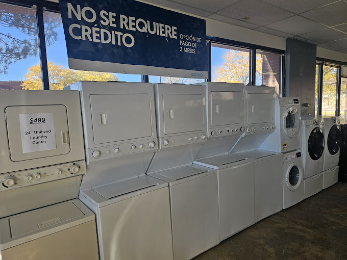 A row of washers and dryers in a store